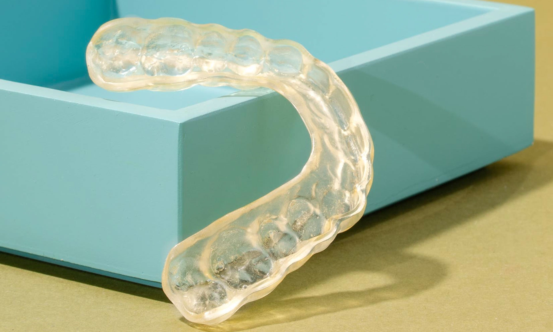 https://thedentalgroupatcentralcity.com/wp-content/uploads/2023/12/mouth-guard-grinding.jpg